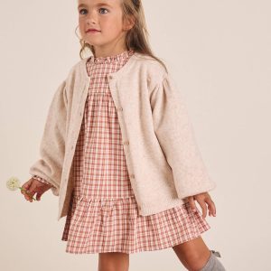 Veste en maille beige avec boutons en bois