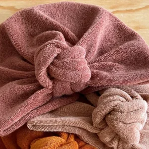 Turban noeud fleur en éponge vieux rose
