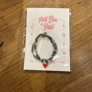 Bracelet Liberty coulissant vert coeur fuchsia