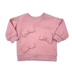 Coton ouaté rose avec trois boucles sur le devant